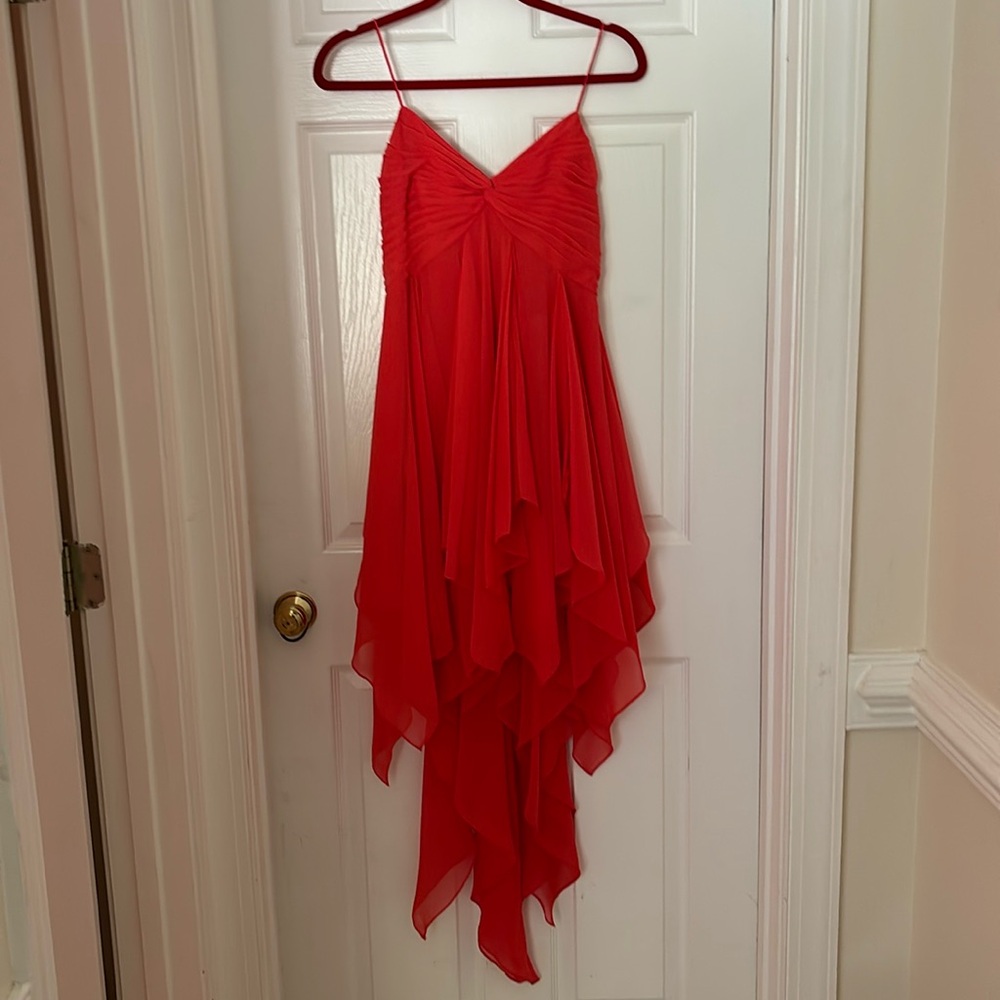 Cocktail dress with cascade skirt